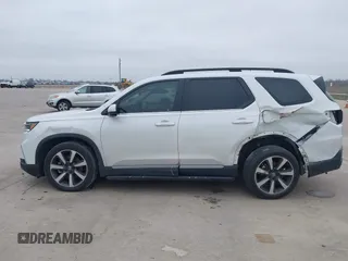 2023 Honda Pilot Elite with VIN 5FNYG1H88PB000855, listed as a IAAI auction lot 41574247 with 47,011 mi miles. Bid and sale history available at carsss.com. Image 14.