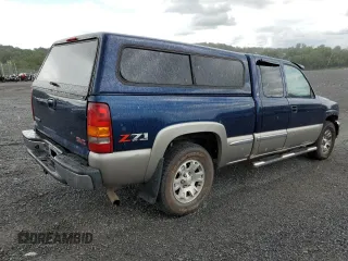 2001 GMC Sierra 1500 SLE z VIN 1GTEK19T11Z241405, wystawiony jako Copart lot #67396344 z przebiegiem 136 051 mil mil oraz Szkoda całkowita • Salvage title. Historia ofert i sprzedaży dostępna na DreamBid. Obrazek 3.