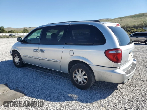 2005 Chrysler Town & Country Touring z VIN 2C4GP54L05R430233, wystawiony jako Copart lot #56189765 z przebiegiem 190 187 mil mil oraz Szkody całkowita. Historia ofert i sprzedaży dostępna na DreamBid. Obrazek 2.