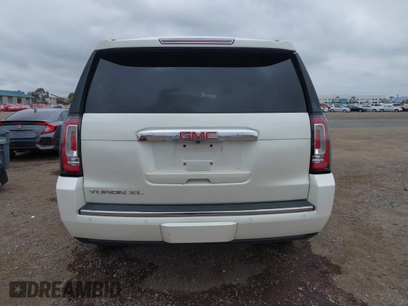 2015 GMC Yukon XL Denali with VIN 1GKS2JKJ7FR641430, listed as a IAAI auction lot 42163969 with 129,085 mi miles. Bid and sale history available at carsss.com. Image 16.