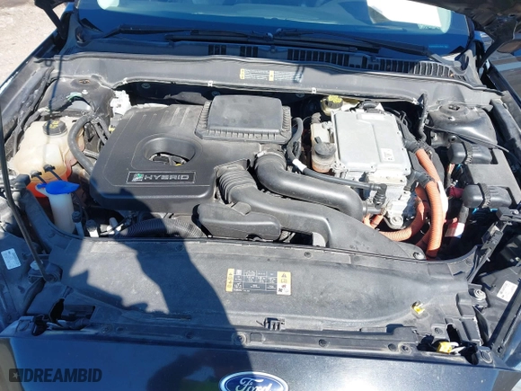 2015 Ford Fusion Titanium Hybrid with VIN 3FA6P0RUXFR119698, listed as a IAAI auction lot 41791411 with 140,646 mi miles. Bid and sale history available at carsss.com. Image 10.
