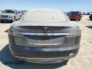 2013 Tesla Model S with VIN 5YJSA1AC9DFP10400, listed as a Copart auction lot 64096555 with 165,166 mi miles and Salvage title. Bid and sale history available at DreamBid. Image 6.
