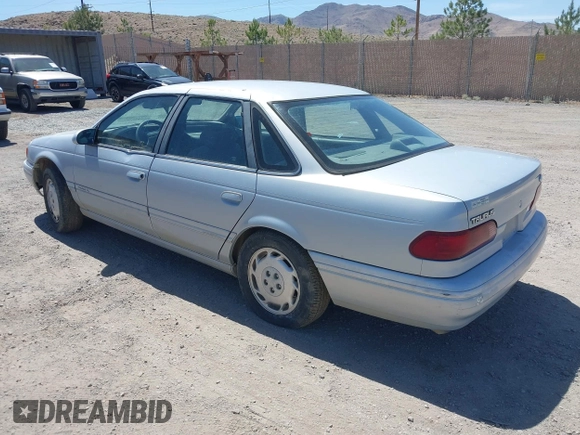 1994 Ford Taurus GL z VIN 1FALP52U2RG186625, wystawiony jako IAAI lot #42381964 z przebiegiem 54 020 mil mil oraz . Historia ofert i sprzedaży dostępna na DreamBid. Obrazek 3.