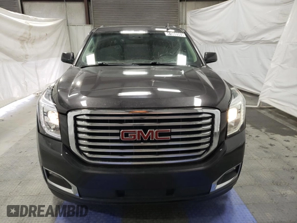 2018 GMC Yukon SLT with VIN 1GKS1BKCXJR293982, listed as a Copart auction lot 41860985 with 106,966 mi miles and Clean Title. Bid and sale history available at carsss.com. Image 5.