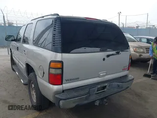 2005 GMC Yukon SLT z VIN 1GKEC13V65J250116, wystawiony jako IAAI lot #42497157 z przebiegiem 196 813 mil mil oraz . Historia ofert i sprzedaży dostępna na DreamBid. Obrazek 3.