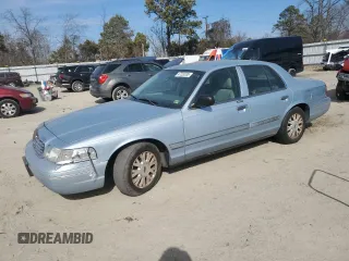 2005 Ford Crown Victoria LX z VIN 2FAFP74W65X168866, wystawiony jako Copart lot #47220335 z przebiegiem 163 973 mil mil oraz Szkoda całkowita • Salvage title. Historia ofert i sprzedaży dostępna na DreamBid. Obrazek 1.