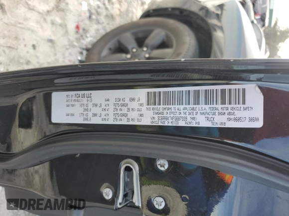 2015 Ram 1500 Express with VIN 3C6RR6KT4FG687339, listed as a Copart auction lot 48102595 with 164,111 mi miles and Salvage title. Bid and sale history available at DreamBid. Image 12.