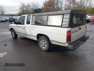 1997 Nissan Frontier XE with VIN 1N6SD16S1VC351353, listed as a IAAI auction lot 41623370 with 198,230 mi miles and . Bid and sale history available at DreamBid. Image 3.