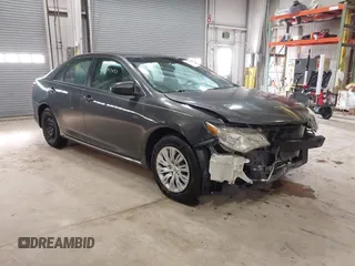 2013 Toyota Camry L with VIN 4T4BF1FK2DR286536, listed as a IAAI auction lot 41974133 with 122,064 mi miles. Bid and sale history available at carsss.com. Image 1.