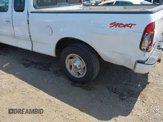 2000 Ford F-150 XL with VIN 1FTRX17L2YNA03263, listed as a IAAI auction lot 42326528 with Not provided miles and . Bid and sale history available at DreamBid. Image 17.