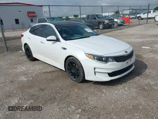 2016 Kia Optima EX with VIN 5XXGU4L38GG013197, listed as a IAAI auction lot 42125301 with 110,128 mi miles. Bid and sale history available at carsss.com. Image 1.