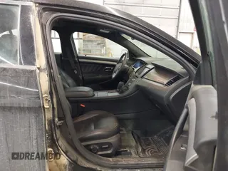 2014 Ford Taurus SEL with VIN 1FAHP2E87EG117653, listed as a IAAI auction lot 41589415 with 125,040 mi miles. Bid and sale history available at carsss.com. Image 5.