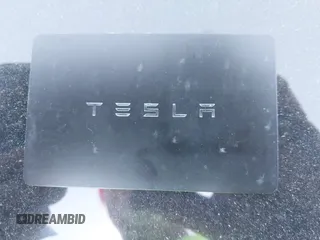 2023 Tesla Model Y Performance with VIN 7SAYGDEF2PF800641, listed as a IAAI auction lot 41612596 with 60,984 mi miles and . Bid and sale history available at DreamBid. Image 11.