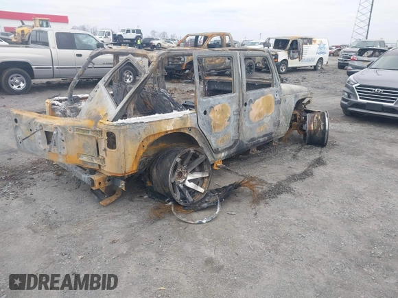 2008 Jeep Wrangler Unlimited Sahara with VIN 1J4GA59158L525516, listed as a IAAI auction lot 41611079 with Not Provided miles and . Bid and sale history available at DreamBid. Image 4.