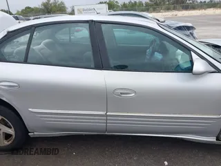 2003 Pontiac Bonneville SE z VIN 1G2HX52K034121638, wystawiony jako IAAI lot #41859616 z przebiegiem 205 353 mil mil oraz . Historia ofert i sprzedaży dostępna na DreamBid. Obrazek 13.