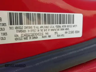 2014 Dodge Grand Caravan SXT with VIN 2C4RDGCG8ER245316, listed as a IAAI auction lot 41871425 with 150,361 mi miles and . Bid and sale history available at DreamBid. Image 9.