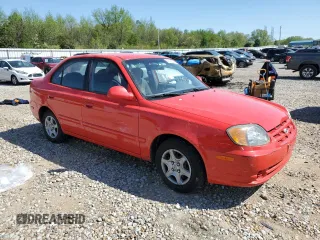 2005 Hyundai Accent GLS with VIN KMHCG45C15U592443, listed as a Copart auction lot 52291025 with 142,263 mi miles and Salvage Title. Bid and sale history available at carsss.com. Image 4.