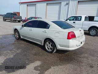 2004 Mitsubishi Galant ES z VIN 4A3AB36F14E132394, wystawiony jako IAAI lot #41946982 z przebiegiem 167 162 mil mil oraz . Historia ofert i sprzedaży dostępna na DreamBid. Obrazek 3.