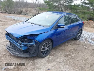 2018 Ford Focus SE z VIN 1FADP3F25JL255840, wystawiony jako IAAI lot #41852913 z przebiegiem 64 010 mil mil oraz . Historia ofert i sprzedaży dostępna na DreamBid. Obrazek 17.