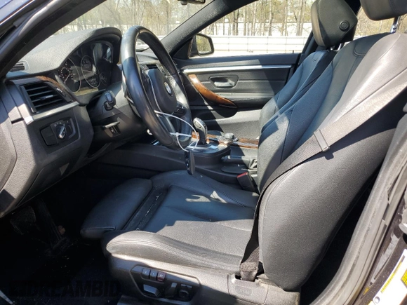 2015 BMW 4 Series 428i xDrive with VIN WBA4A7C58FD413734, listed as a Copart auction lot 50252325 with 74,629 mi miles and Salvage title. Bid and sale history available at DreamBid. Image 7.