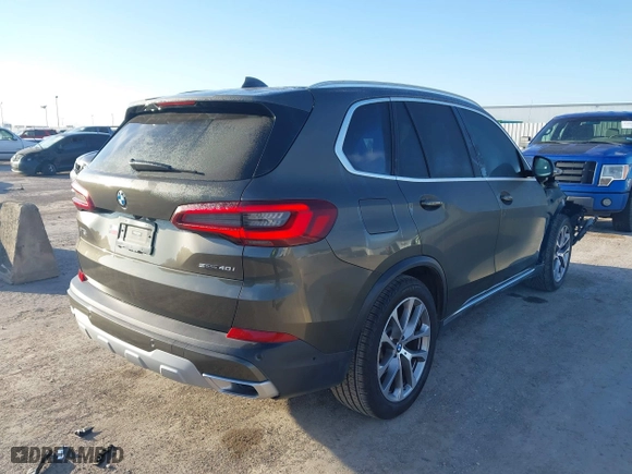 2023 BMW X5 sDrive40i with VIN 5UXCR4C02P9S02333, listed as a IAAI auction lot 41219318 with 32,966 mi miles. Bid and sale history available at carsss.com. Image 4.