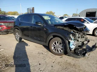 2023 Mazda CX-5 2.5 S Preferred Package with VIN JM3KFBCM8P0227133, listed as a Copart auction lot 77595004 with 25,204 mi miles and Salvage Title. Bid and sale history available at carsss.com. Image 4.