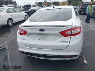 2015 Ford Fusion Titanium Hybrid with VIN 3FA6P0RU3FR247118, listed as a IAAI auction lot 41210219 with 143,348 mi miles. Bid and sale history available at carsss.com. Image 16.