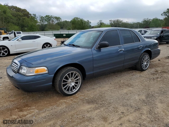 2009 Ford Crown Victoria LX with VIN 2FAHP74V79X124042, listed as a Copart auction lot 50974145 with 115,223 mi miles and Salvage Title. Bid and sale history available at carsss.com. Image 1.