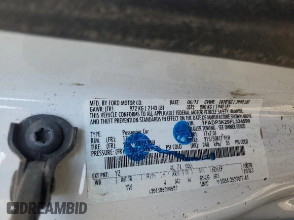 2015 Ford Focus SE with VIN 1FADP3K29FL334599, listed as a Copart auction lot 46926475 with 127,537 mi miles and Salvage Title. Bid and sale history available at DreamBid. Image 14.