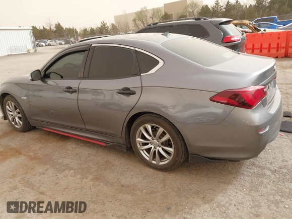 2015 Infiniti M35h Hybrid with VIN JN1EY1AP2FM510029, listed as a IAAI auction lot 41795913 with 152,475 mi miles. Bid and sale history available at carsss.com. Image 14.