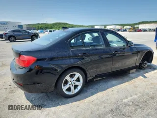 2014 BMW 3 Series 320i xDrive with VIN WBA3C3G5XENS71856, listed as a Copart auction lot 58265805 with 122,478 mi miles and Salvage title. Bid and sale history available at DreamBid. Image 3.