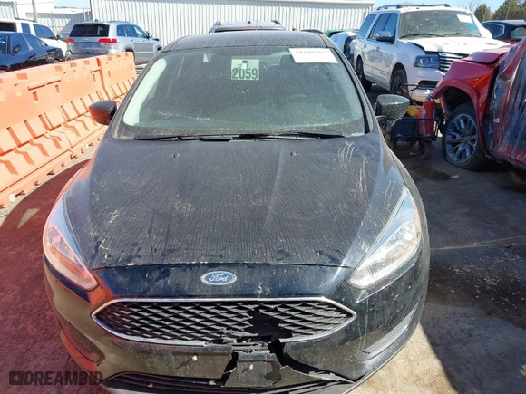 2018 Ford Focus SE with VIN 1FADP3F21JL259271, listed as a IAAI auction lot 41689494 with 94,190 mi miles. Bid and sale history available at carsss.com. Image 12.