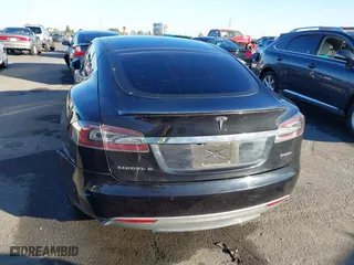2015 Tesla Model S 85D with VIN 5YJSA1H46FF096603, listed as a IAAI auction lot 41084296 with 114,466 mi miles. Bid and sale history available at carsss.com. Image 16.