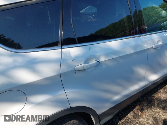 2013 Ford Escape SE with VIN 1FMCU0GX4DUC68046, listed as a IAAI auction lot 42839369 with 185,429 mi miles and . Bid and sale history available at DreamBid. Image 6.