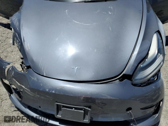 2022 Tesla Model 3 z VIN 5YJ3E1EA1NF191426, wystawiony jako Copart lot #56656125 z przebiegiem 84 255 mil mil oraz Czysty tytuł • Clean title. Historia ofert i sprzedaży dostępna na DreamBid. Obrazek 11.