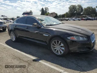 2013 Jaguar XF I4 RWD with VIN SAJWA0ES6DPS88882, listed as a Copart auction lot 70230634 with 84,496 mi miles and Salvage Title. Bid and sale history available at carsss.com. Image 4.