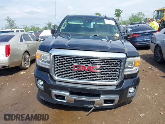 2016 GMC Sierra 2500HD Denali z VIN 1GT12UE84GF259750, wystawiony jako IAAI lot #42221632 z przebiegiem 201 055 mil mil oraz . Historia ofert i sprzedaży dostępna na DreamBid. Obrazek 13.