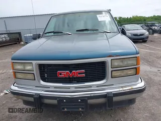 1994 GMC Suburban z VIN 1GKEC16K2RJ750376, wystawiony jako IAAI lot #42278734 z przebiegiem 185 403 mil mil oraz . Historia ofert i sprzedaży dostępna na DreamBid. Obrazek 6.
