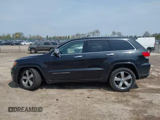 2016 Jeep Grand Cherokee Overland with VIN 1C4RJFCG5GC343752, listed as a IAAI auction lot 42138080 with 86,777 mi miles and . Bid and sale history available at DreamBid. Image 14.