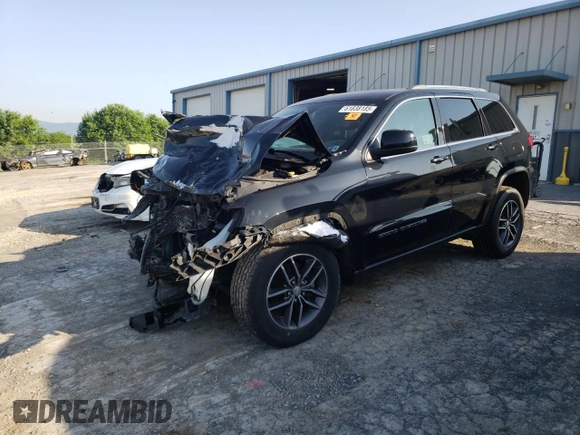 2018 Jeep Grand Cherokee Laredo E with VIN 1C4RJFAG5JC487487, listed as a Copart auction lot 61838185 with 54,297 mi miles and Salvage title. Bid and sale history available at DreamBid. Image 1.