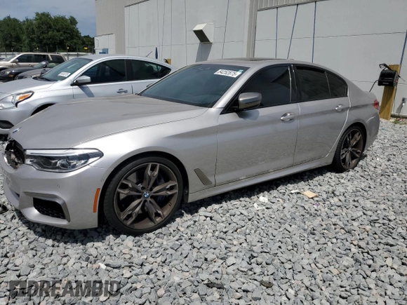 2019 BMW 5 Series M550i xDrive with VIN WBAJB9C53KB464902, listed as a Copart auction lot 54252875 with 45,157 mi miles and Salvage title. Bid and sale history available at DreamBid. Image 1.