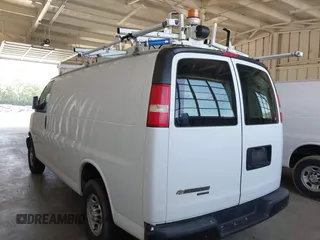 2015 Chevrolet Express Cargo with VIN 1GCWGFCF9F1277631, listed as a IAAI auction lot 42528992 with 243,209 mi miles and . Bid and sale history available at DreamBid. Image 3.