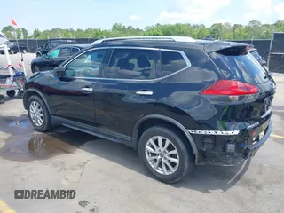 2017 Nissan Rogue S with VIN KNMAT2MT9HP574966, listed as a IAAI auction lot 42128575 with 203,079 mi miles and . Bid and sale history available at carsss.com. Image 3.