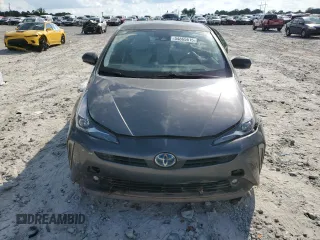 2022 Toyota Prius L Eco z VIN JTDKAMFU8N3173133, wystawiony jako Copart lot #54865615 z przebiegiem 100 876 mil mil oraz Szkoda całkowita • Salvage title. Historia ofert i sprzedaży dostępna na DreamBid. Obrazek 5.