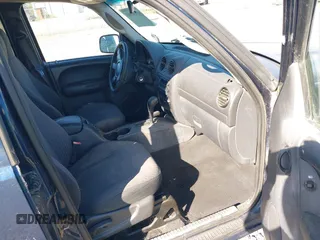 2003 Jeep Liberty Sport with VIN 1J4GL48K83W663248, listed as a IAAI auction lot 42056561 with 161,652 mi miles. Bid and sale history available at carsss.com. Image 5.
