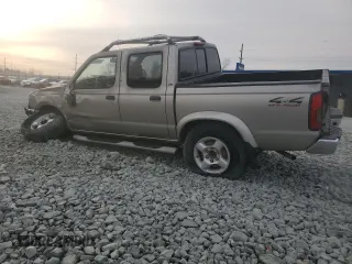 2000 Nissan Frontier XE with VIN 1N6ED27Y3YC366060, listed as a Copart auction lot 48955585 with 158,565 mi miles and Salvage title. Bid and sale history available at DreamBid. Image 2.