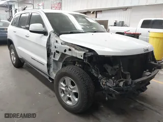 2017 Jeep Grand Cherokee Laredo with VIN 1C4RJEAG3HC888203, listed as a IAAI auction lot 41744695 with 123,138 mi miles. Bid and sale history available at carsss.com. Image 1.