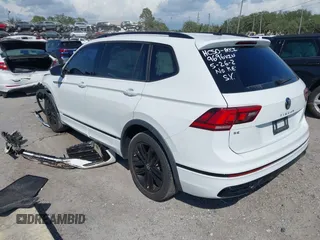 2022 Volkswagen Tiguan SE R-Line Black with VIN 3VVCB7AX5NM009696, listed as a IAAI auction lot 42364884 with 45,380 mi miles and . Bid and sale history available at DreamBid. Image 3.