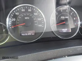 2009 Jeep Grand Cherokee Laredo with VIN 1J8GS48K39C549136, listed as a IAAI auction lot 41446925 with 162,639 mi miles. Bid and sale history available at carsss.com. Image 7.