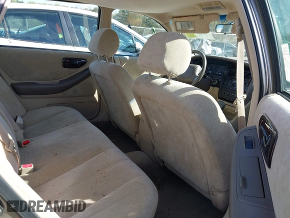 1998 Toyota Avalon XL with VIN 4T1BF18B0WU218570, listed as a IAAI auction lot 41790708 with 103,906 mi miles and . Bid and sale history available at DreamBid. Image 8.